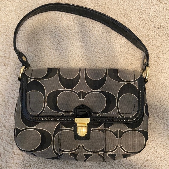 Black, gray, gold coach purse. Small scratch shown on buckle in picture. - Picture 1 of 8